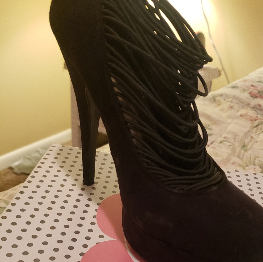Black extreme high heels